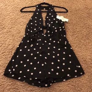 Francesca’s Collection black romper. NWT.